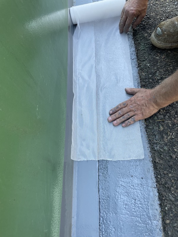 Installing 9311 Sheet into Belzona 3111